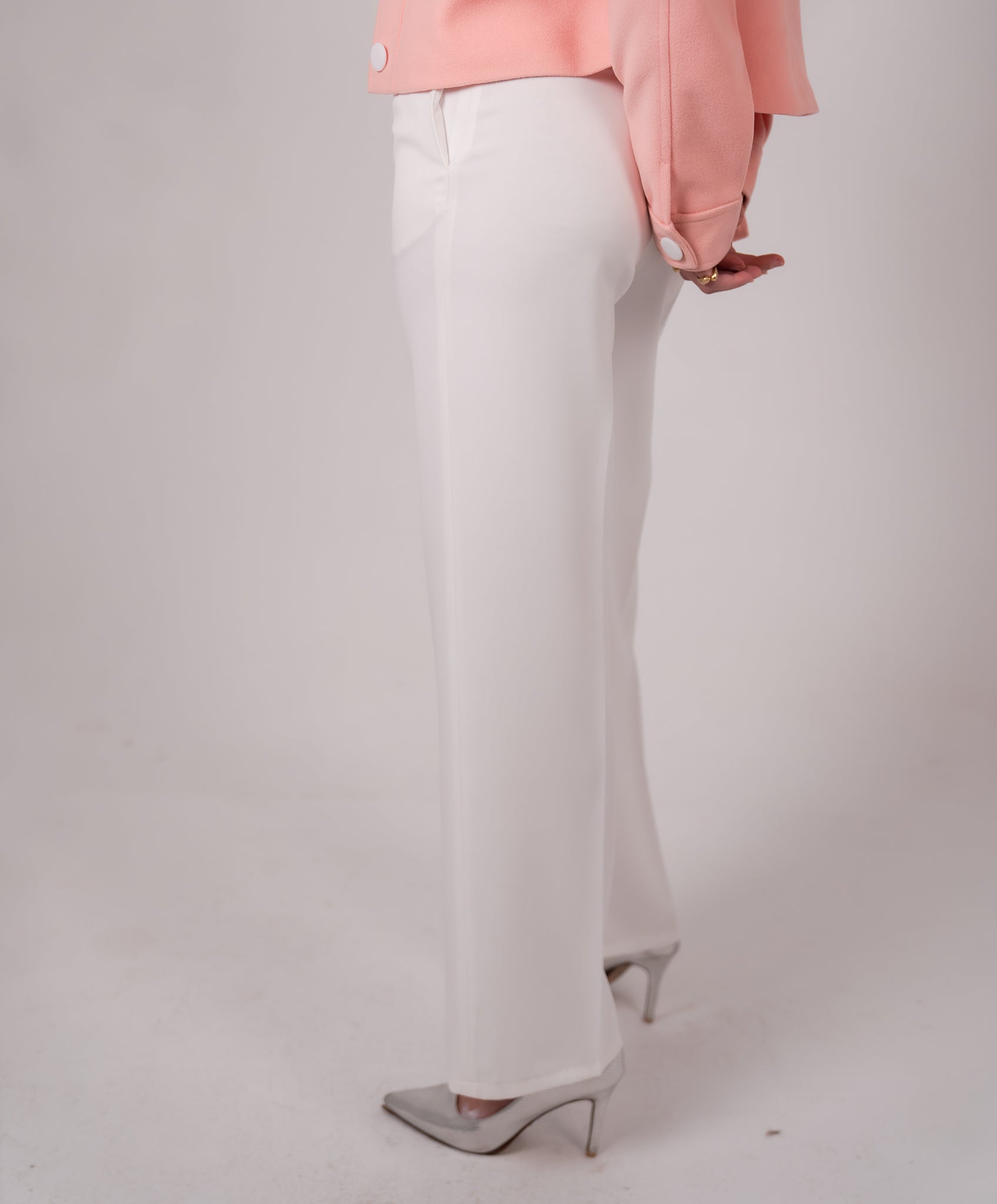 White flared trousers