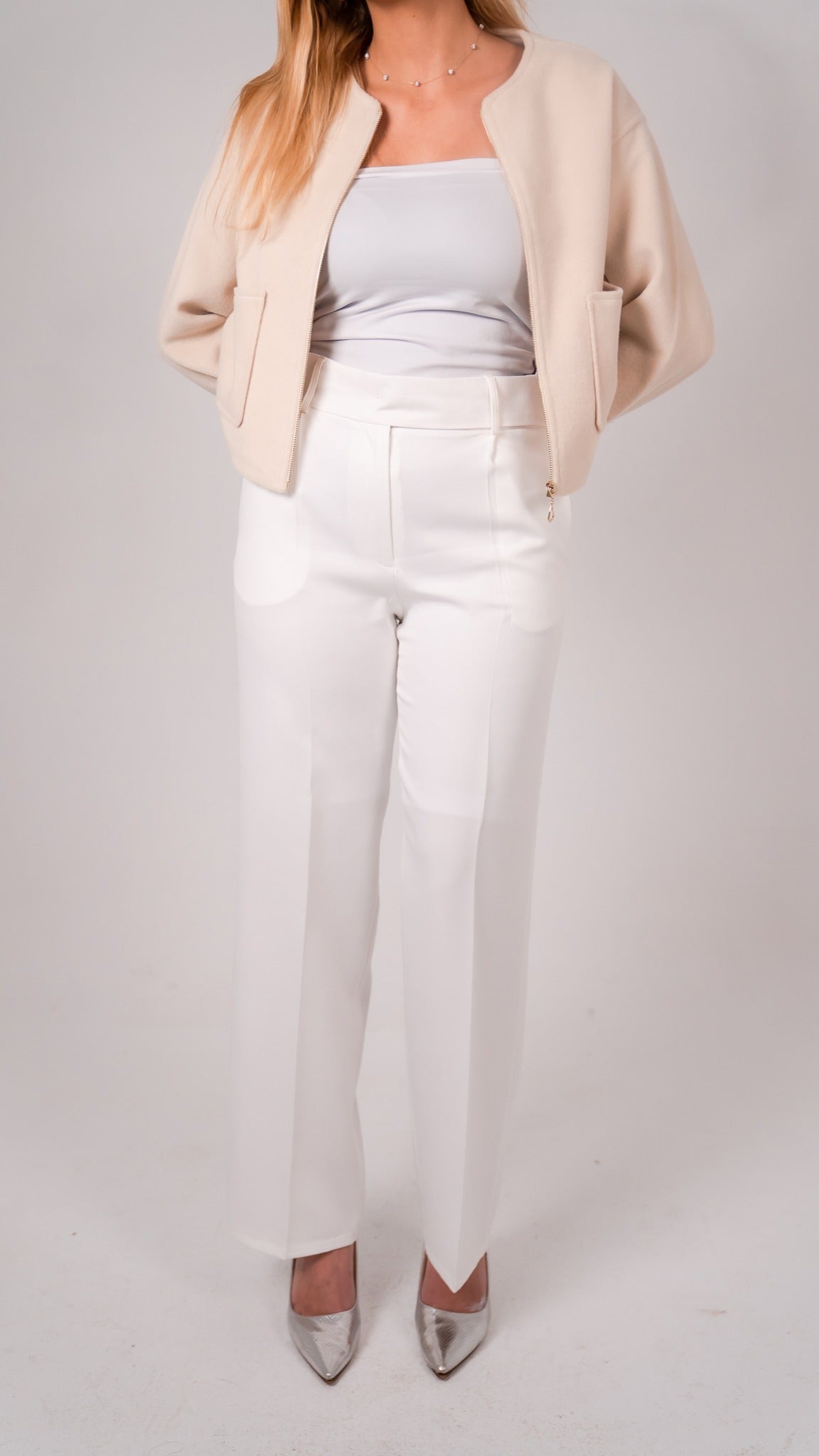 White flared trousers